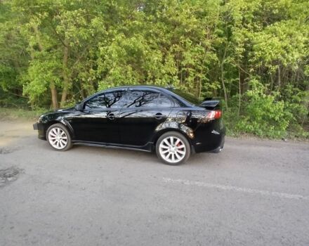 Черный Мицубиси Лансер, объемом двигателя 2 л и пробегом 245 тыс. км за 7500 $, фото 2 на Automoto.ua