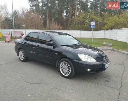 Чорний Міцубісі Lancer, об'ємом двигуна 1.58 л та пробігом 190 тис. км за 3750 $, фото 9 на Automoto.ua