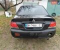 Чорний Міцубісі Lancer, об'ємом двигуна 1.58 л та пробігом 227 тис. км за 4100 $, фото 2 на Automoto.ua