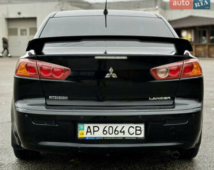 Черный Мицубиси Лансер, объемом двигателя 2 л и пробегом 215 тыс. км за 5500 $, фото 8 на Automoto.ua