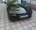 Чорний Міцубісі Lancer, об'ємом двигуна 2 л та пробігом 330 тис. км за 6022 $, фото 1 на Automoto.ua