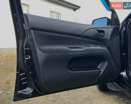 Чорний Міцубісі Lancer, об'ємом двигуна 1.58 л та пробігом 185 тис. км за 3750 $, фото 12 на Automoto.ua