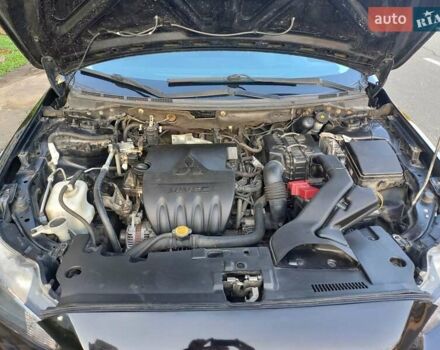 Чорний Міцубісі Lancer, об'ємом двигуна 1.5 л та пробігом 242 тис. км за 5550 $, фото 47 на Automoto.ua