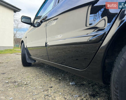 Чорний Міцубісі Lancer, об'ємом двигуна 1.58 л та пробігом 185 тис. км за 3750 $, фото 7 на Automoto.ua