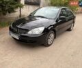 Чорний Міцубісі Lancer, об'ємом двигуна 1.58 л та пробігом 225 тис. км за 4180 $, фото 1 на Automoto.ua