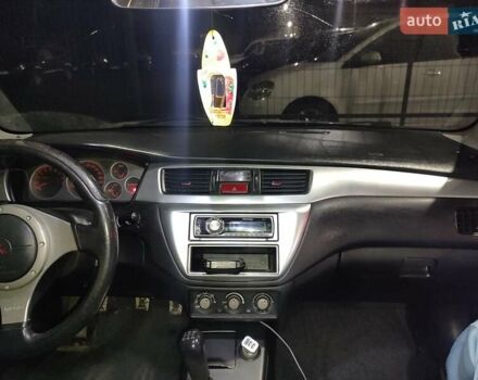Чорний Міцубісі Lancer, об'ємом двигуна 2 л та пробігом 145 тис. км за 5000 $, фото 7 на Automoto.ua