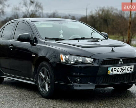 Черный Мицубиси Лансер, объемом двигателя 2 л и пробегом 215 тыс. км за 5500 $, фото 5 на Automoto.ua