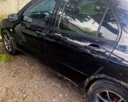 Чорний Міцубісі Lancer, об'ємом двигуна 1.6 л та пробігом 320 тис. км за 2500 $, фото 7 на Automoto.ua