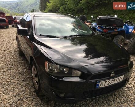Черный Мицубиси Лансер, объемом двигателя 1.5 л и пробегом 240 тыс. км за 6900 $, фото 24 на Automoto.ua