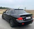 Чорний Міцубісі Lancer, об'ємом двигуна 1.6 л та пробігом 212 тис. км за 4700 $, фото 3 на Automoto.ua