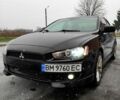 Чорний Міцубісі Lancer, об'ємом двигуна 2 л та пробігом 156 тис. км за 7400 $, фото 1 на Automoto.ua