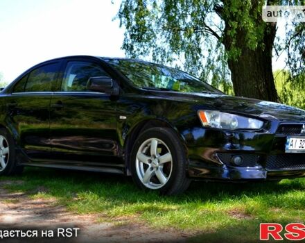 Чорний Міцубісі Lancer, об'ємом двигуна 1.8 л та пробігом 226 тис. км за 6600 $, фото 7 на Automoto.ua