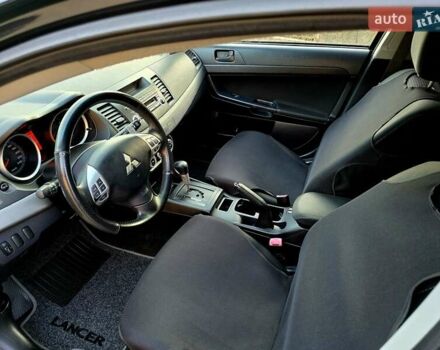 Чорний Міцубісі Lancer, об'ємом двигуна 2 л та пробігом 260 тис. км за 6555 $, фото 23 на Automoto.ua