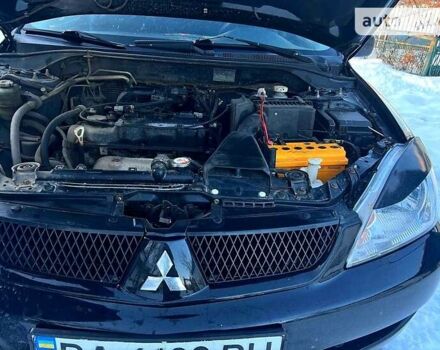 Чорний Міцубісі Lancer, об'ємом двигуна 1.6 л та пробігом 307 тис. км за 4000 $, фото 9 на Automoto.ua