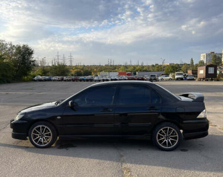 Чорний Міцубісі Lancer, об'ємом двигуна 2 л та пробігом 280 тис. км за 4600 $, фото 10 на Automoto.ua