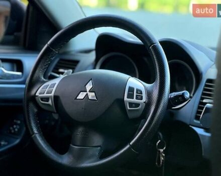 Черный Мицубиси Лансер, объемом двигателя 2 л и пробегом 205 тыс. км за 6500 $, фото 9 на Automoto.ua