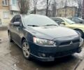 Черный Мицубиси Лансер, объемом двигателя 2 л и пробегом 25000 тыс. км за 6200 $, фото 1 на Automoto.ua