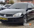 Черный Мицубиси Лансер, объемом двигателя 1.6 л и пробегом 147 тыс. км за 4999 $, фото 2 на Automoto.ua