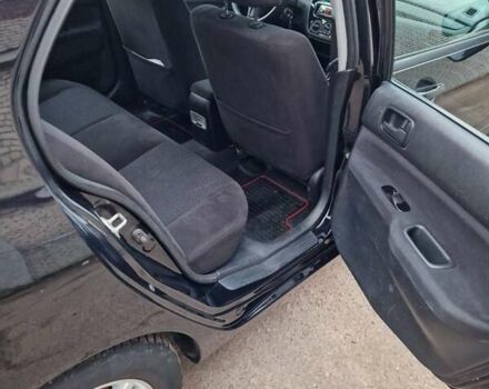 Чорний Міцубісі Lancer, об'ємом двигуна 1.6 л та пробігом 273 тис. км за 3999 $, фото 26 на Automoto.ua