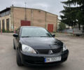 Чорний Міцубісі Lancer, об'ємом двигуна 1.58 л та пробігом 256 тис. км за 4200 $, фото 1 на Automoto.ua