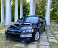 Чорний Міцубісі Lancer, об'ємом двигуна 2 л та пробігом 280 тис. км за 5200 $, фото 1 на Automoto.ua
