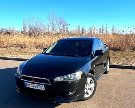 Чорний Міцубісі Lancer, об'ємом двигуна 2 л та пробігом 196 тис. км за 7500 $, фото 1 на Automoto.ua