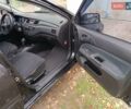 Чорний Міцубісі Lancer, об'ємом двигуна 1.58 л та пробігом 227 тис. км за 4100 $, фото 12 на Automoto.ua
