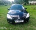 Чорний Міцубісі Lancer, об'ємом двигуна 1.58 л та пробігом 400 тис. км за 3700 $, фото 1 на Automoto.ua