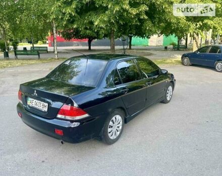 Чорний Міцубісі Lancer, об'ємом двигуна 1.6 л та пробігом 180 тис. км за 4999 $, фото 11 на Automoto.ua