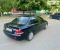 Чорний Міцубісі Lancer, об'ємом двигуна 1.6 л та пробігом 180 тис. км за 4999 $, фото 11 на Automoto.ua