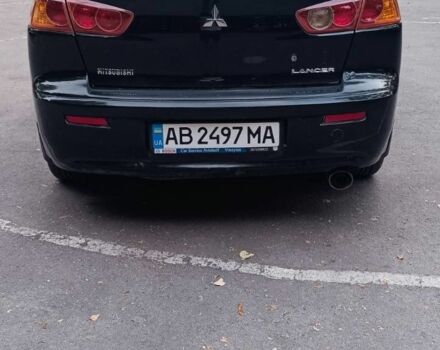 Черный Мицубиси Лансер, объемом двигателя 2 л и пробегом 210 тыс. км за 6000 $, фото 8 на Automoto.ua