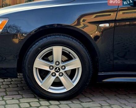 Чорний Міцубісі Lancer, об'ємом двигуна 2 л та пробігом 260 тис. км за 6555 $, фото 12 на Automoto.ua