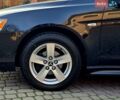 Чорний Міцубісі Lancer, об'ємом двигуна 2 л та пробігом 260 тис. км за 6555 $, фото 12 на Automoto.ua