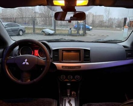 Черный Мицубиси Лансер, объемом двигателя 1.5 л и пробегом 245 тыс. км за 4499 $, фото 8 на Automoto.ua