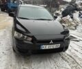 Черный Мицубиси Лансер, объемом двигателя 1.5 л и пробегом 206 тыс. км за 6000 $, фото 1 на Automoto.ua