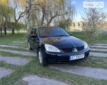 Чорний Міцубісі Lancer, об'ємом двигуна 1.58 л та пробігом 161 тис. км за 5300 $, фото 19 на Automoto.ua