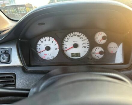 Черный Мицубиси Лансер, объемом двигателя 1.6 л и пробегом 305 тыс. км за 4799 $, фото 5 на Automoto.ua