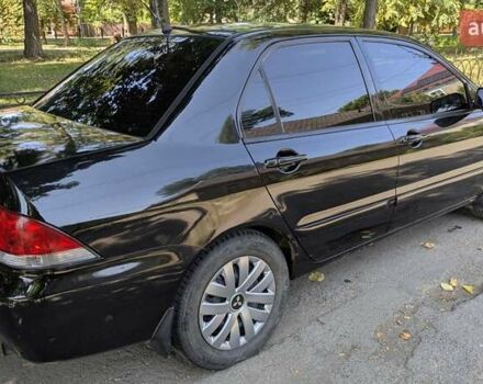 Чорний Міцубісі Lancer, об'ємом двигуна 1.6 л та пробігом 366 тис. км за 3500 $, фото 10 на Automoto.ua