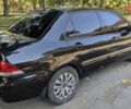 Чорний Міцубісі Lancer, об'ємом двигуна 1.6 л та пробігом 366 тис. км за 3500 $, фото 10 на Automoto.ua