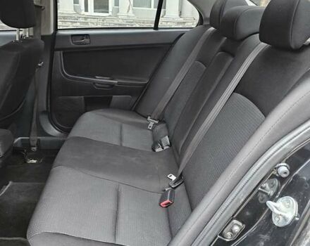 Міцубісі Lancer 2007 у Києві на Automoto.ua Чорний Міцубісі Lancer, об'ємом двигуна 2 л та пробігом 115 тис. км за 5000 $, фото 18 на Automoto.ua
