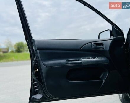 Чорний Міцубісі Lancer, об'ємом двигуна 1.6 л та пробігом 243 тис. км за 4950 $, фото 37 на Automoto.ua