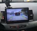 Черный Мицубиси Лансер, объемом двигателя 2 л и пробегом 277 тыс. км за 4650 $, фото 4 на Automoto.ua