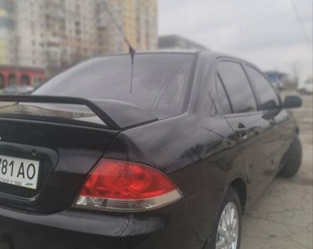 Черный Мицубиси Лансер, объемом двигателя 1.6 л и пробегом 310 тыс. км за 5700 $, фото 11 на Automoto.ua