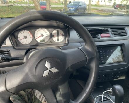 Міцубісі Lancer 2007 у Каневе на Automoto.ua Чорний Міцубісі Lancer, об'ємом двигуна 1.6 л та пробігом 310 тис. км за 4100 $, фото 8 на Automoto.ua
