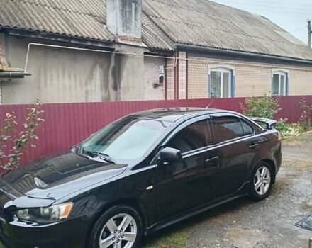 Чорний Міцубісі Lancer, об'ємом двигуна 2 л та пробігом 273 тис. км за 7100 $, фото 1 на Automoto.ua