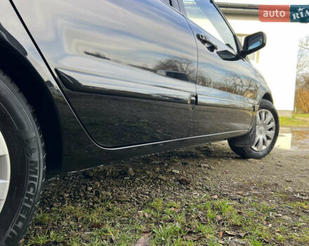 Чорний Міцубісі Lancer, об'ємом двигуна 1.58 л та пробігом 185 тис. км за 3750 $, фото 6 на Automoto.ua