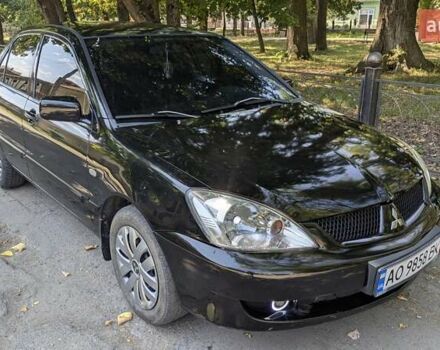 Чорний Міцубісі Lancer, об'ємом двигуна 1.6 л та пробігом 366 тис. км за 3500 $, фото 6 на Automoto.ua