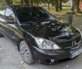 Чорний Міцубісі Lancer, об'ємом двигуна 1.6 л та пробігом 366 тис. км за 3500 $, фото 6 на Automoto.ua