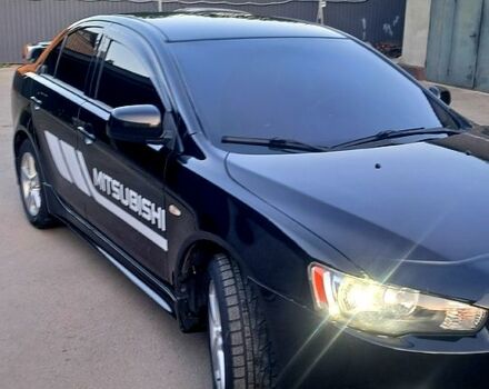 Чорний Міцубісі Lancer, об'ємом двигуна 2 л та пробігом 170 тис. км за 6800 $, фото 2 на Automoto.ua