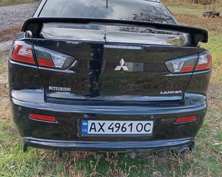 Черный Мицубиси Лансер, объемом двигателя 2 л и пробегом 200 тыс. км за 5900 $, фото 4 на Automoto.ua